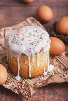 Easter holiday concept. Easter Cake with eggs on wooden background