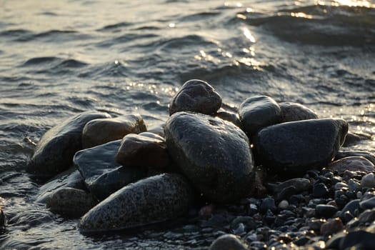 Natural background with large stones and waves.