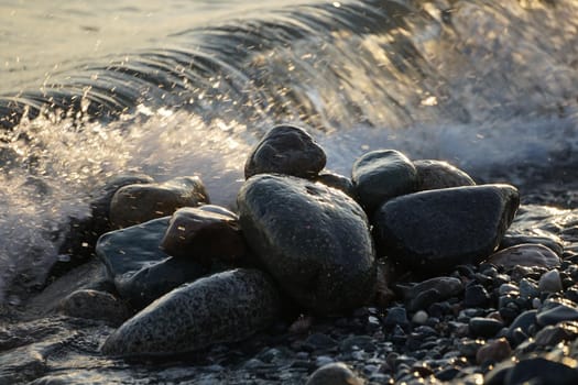 Natural background with large stones and waves.