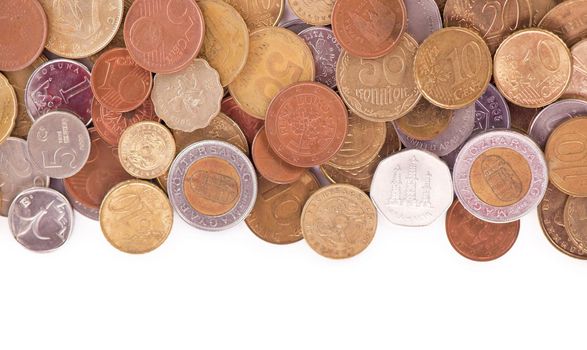 Coins of different countries on a white background