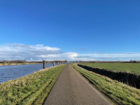 Road next to the Prinses Margriet canal in Friesland The Netherlands