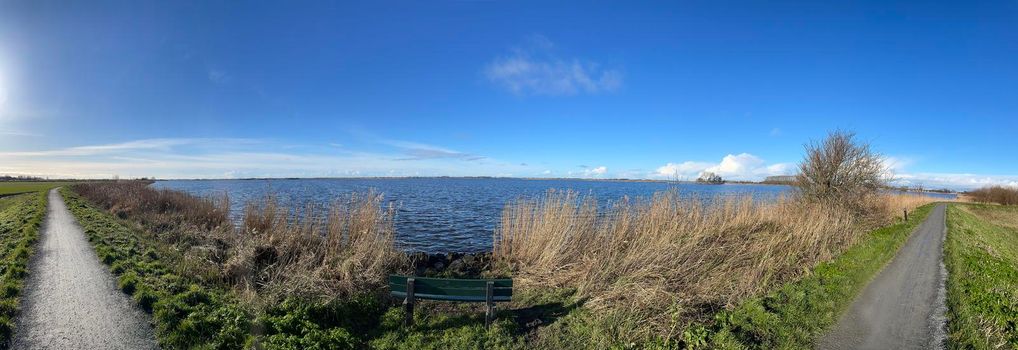 Panorama from a path around the Sneekermeer around Goingarijp in Friesland The Netherlands