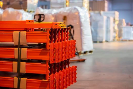Stacked metal structure of warehouse shelves for storing products.