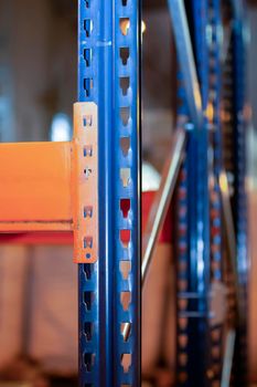 Metal joints of warehouse shelves.