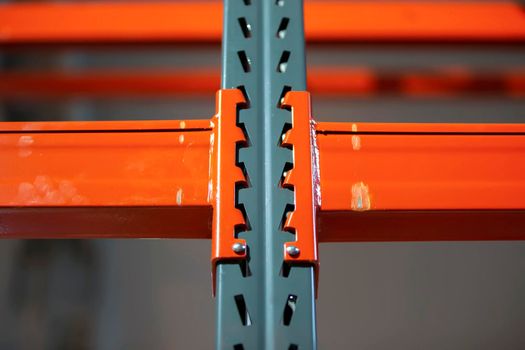 Metal joints of warehouse shelves.