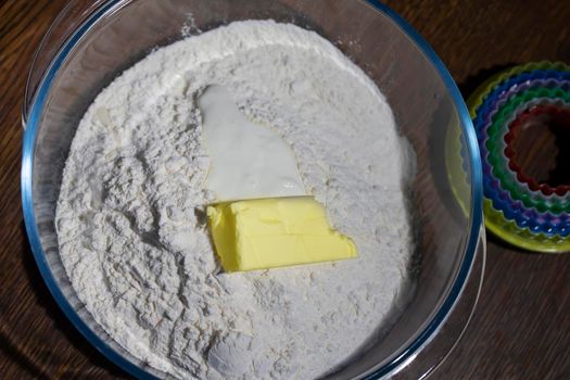 Baking. A piece of butter or margarine in flour.