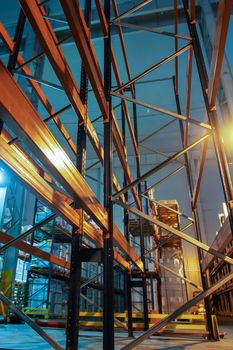 Warehouse premises of a factory or workshop with metal shelves.
