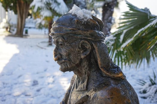 bronze sculpture standing on the quay of Muhajirs in Sukhum, Abkhazia