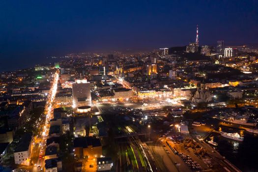Aerial view of the night cityscape. Vladivostok, Russia
