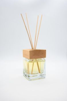 A Bottle of Lavender Fragrant Oil Diffuser with Reed Sticks, isolated on white