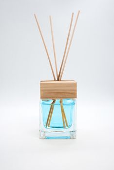 A Bottle of Lavender Fragrant Oil Diffuser with Reed Sticks, isolated on white