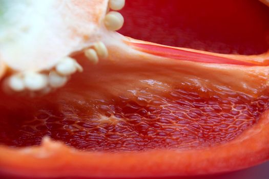 Ripe juicy bell peppers in a cut close-up.