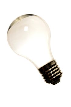 An isolated hollow light bulb over a clean white background.