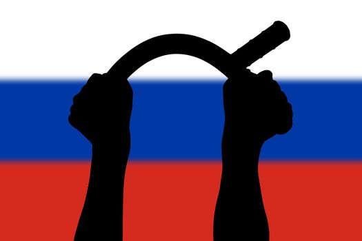 two arms bending police tonfa rubber stick silhouette and blurry russian flag in the background - violent riot control concept