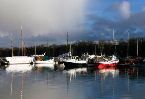 Sailing ships anchored at the bay in Lemvig, Denmark