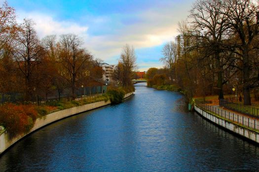 Autumn background scenery by the riverside of Spree, Berlin.