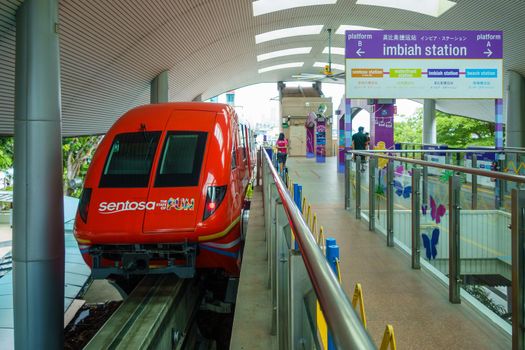 SINGAPORE - CIRCA JANUARY 2016: The Sentosa Express monorail line connecting Sentosa island to HarbourFront on Singapore mainland. Train at Imbiah Station.