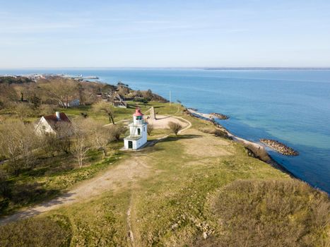 Hundested, Denmark - April 5, 2020: Aerial drone view of Spodsbjerg lighthouse and the coastline