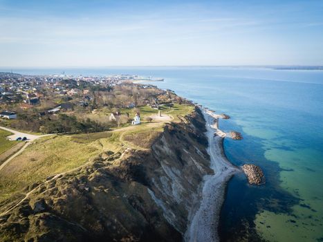 Hundested, Denmark - April 5, 2020: Aerial drone view of Spodsbjerg lighthouse and the coastline