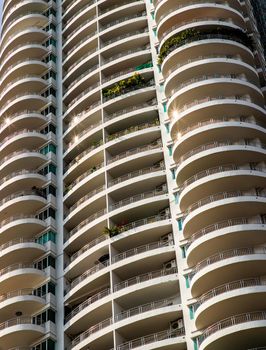 Bangkok, Thailand - 18 Jan 2021 : Low angle looking up at Condominium building with repeating structure. Architecture concept. Selective focus.