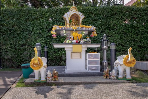 Bangkok, Thailand - 18 Jan 2021 : The Thao Maha Phrom Shrineis a shrine which houses a statue of Phra Phrom (Four faced god). The Thai representation of Brahma, the Hindu god of creation. Selective focus.