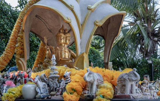 Bangkok, Thailand - 18 Jan 2021 : The Thao Maha Phrom Shrineis a shrine which houses a statue of Phra Phrom (Four faced god). The Thai representation of Brahma, the Hindu god of creation. Selective focus.
