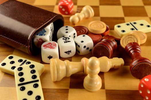 A closeup view of various Classic board game pieces.