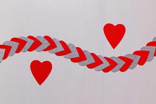 Saint Valentine's day love theme design with red hearts and heart string on textured white background