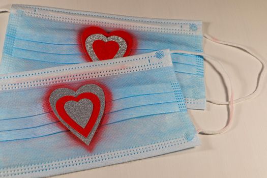 Saint Valentine's day medical facemasks with textured silver and red hearts love theme design