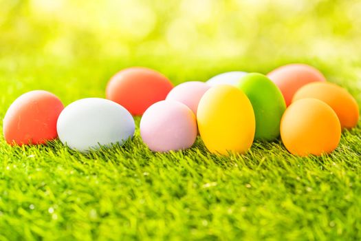 Close up Colorful easter eggs on on green gras background