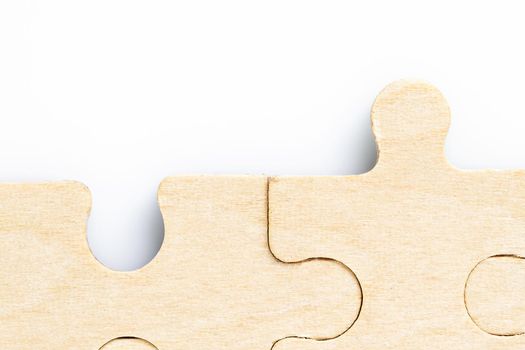 Close up shot of Missing jigsaw puzzle pieces on white background,business concept