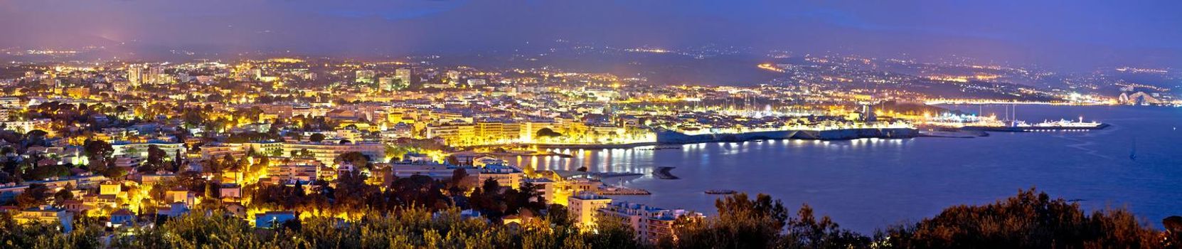 French riviera. Historic town of Antibes coastline panoramic evening view, famous destination in Cote d Azur, France
