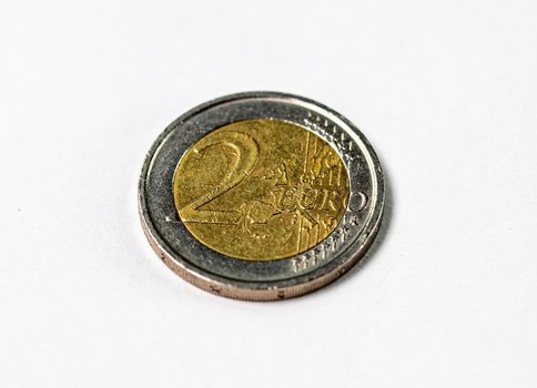 photograph of a two euro coin on a white background