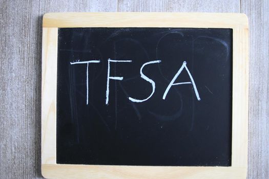 tfsa wrote on a chalk board. TFSA is a canadian savings scheme. High quality photo