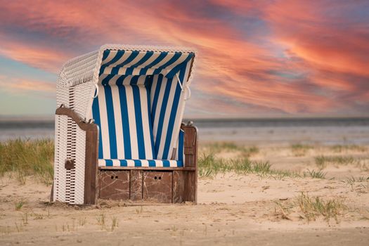 Beach chairs at the coastline of Amrum, North Frisia, Germany 
