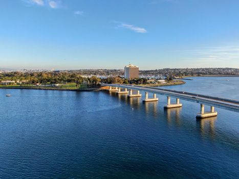  Aerial view of Mission Bay in San Diego, with Ingraham Street bridge during summer sunny day. West Mission Bay drive Bridge famous location in San Diego.
