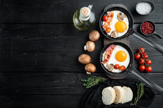 Fried Egg with ingredient in cast iron frying pan, on black wooden table background, top view flat lay , with space for text copyspace