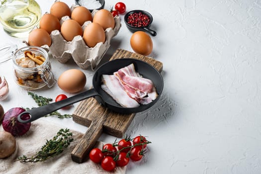 Breakfast egg ingredients mix, on white background , with space for text copyspace