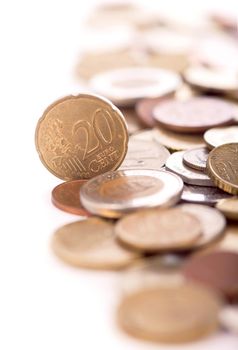 Coins of different countries on a white background