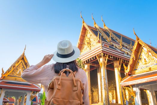 Beautiful asian tourist woman enjoy travel on Vacation in Bangkok at Thailand