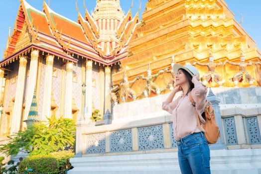 Beautiful asian tourist woman enjoy travel on Vacation in Bangkok at Thailand