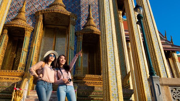 Beautiful asian tourists woman enjoy travel on Vacation in Bangkok at Thailand