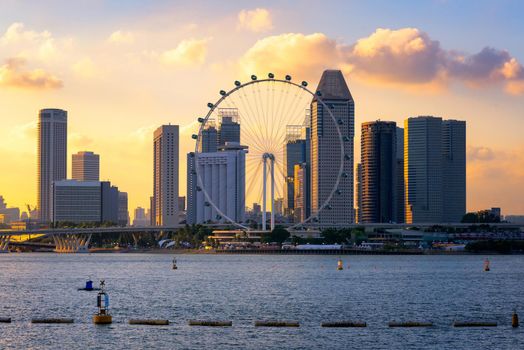 Cityscape view of business downtown building area during sunset time at Singapore.