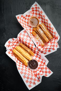 Churros take away set in paper tray, top view flat lay