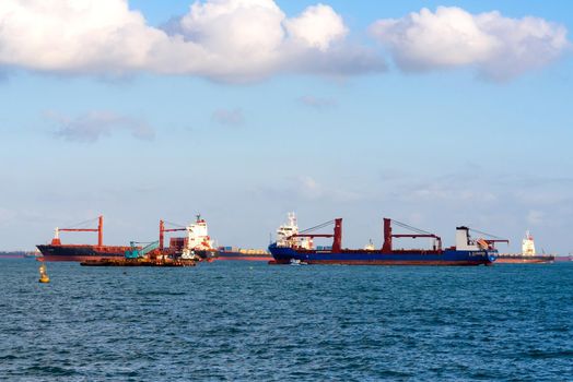 Logistic container ship at shipping yard main transportation of cargo container shipping at Singapore harbour 