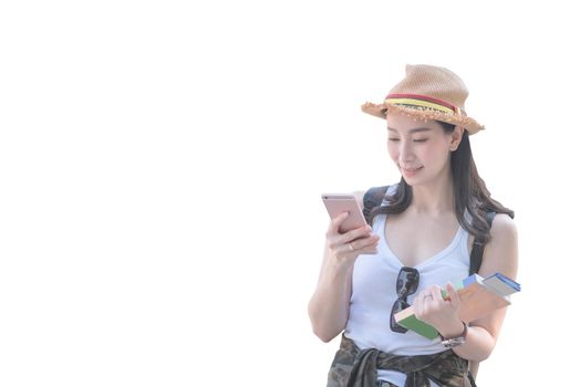 Beautiful asian tourist woman smiling and using mobile phone isolated with clipping path on white background