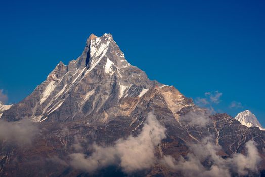 Fishtail peak or Machapuchare mountain with clear blue sky background at Nepal.