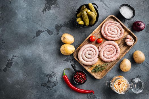 Traditional German Sausages with Mashed Potato and Sauerkraut, on gray background, top view flat lay , with space for text copyspace