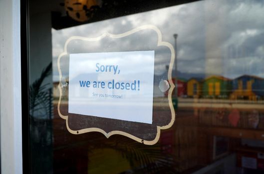 Cape Town, South Africa - 16 April 2020 : Closed sign and beach at Muizenberg in Cape town, South Africa during the lock down.