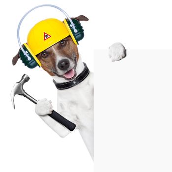 handyman dog with a hammer behind a banner